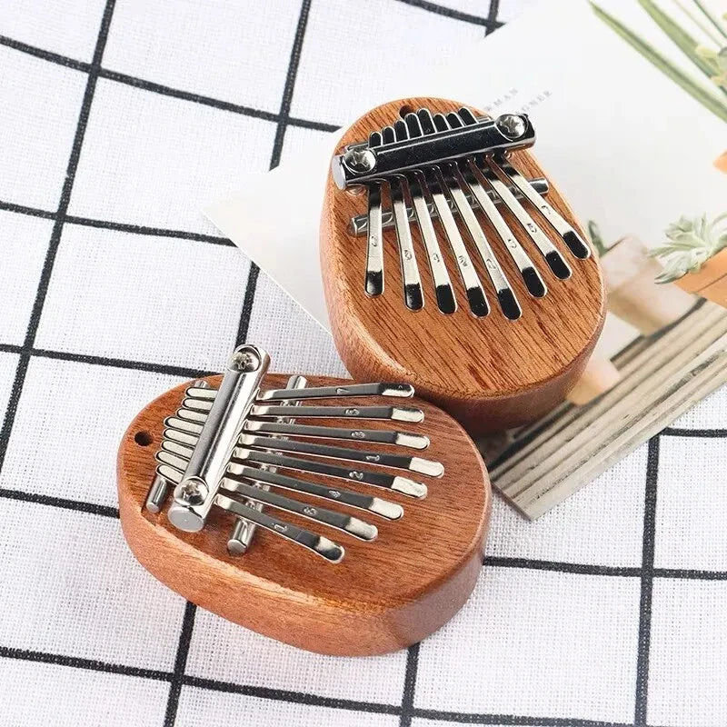 1Pcs Wood Mini Thumb Piano Musical Toys 8 Tones Portable Beginner