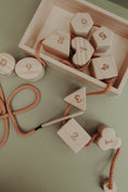 Load image into Gallery viewer, Wooden lacing toy with numbers and geometry shapes
